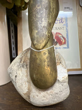 Brass Falcon on Rock