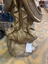 Concrete Gold Diety Statue