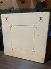 Small framed mirror