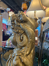 Concrete Gold Diety Statue