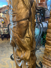 Concrete Gold Diety Statue