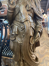 Concrete Gold Diety Statue