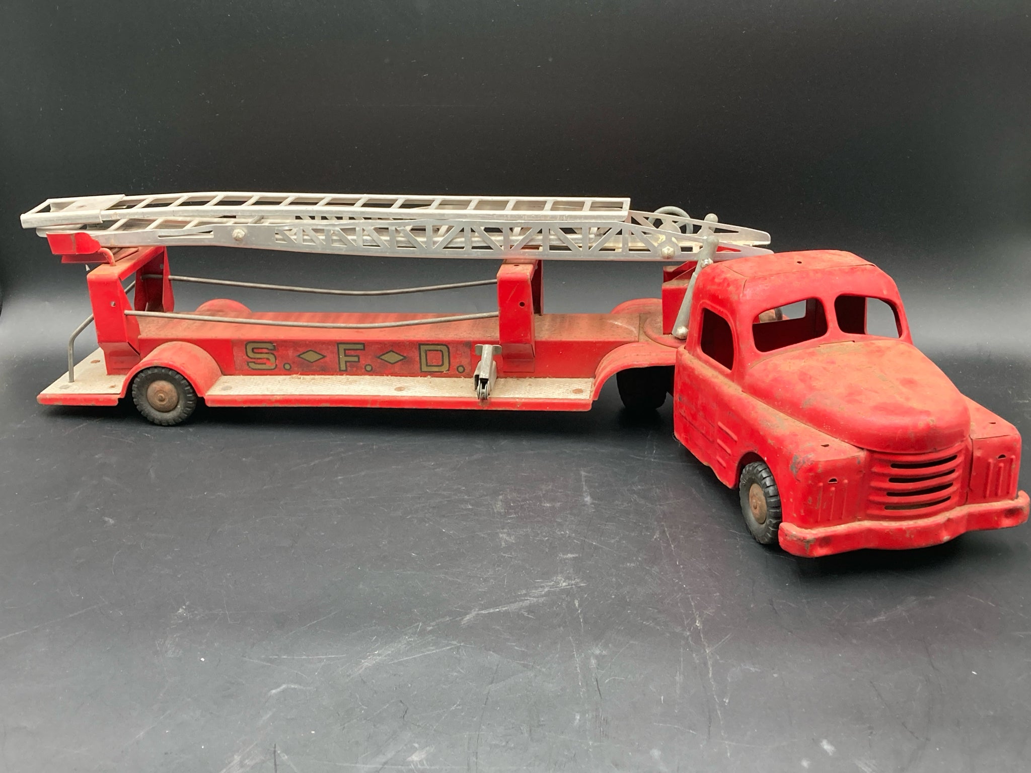 Vintage metal fire truck toy hotsell
