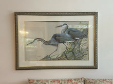 SIGNED ART LAMAY "BLUE HERONS" 27-1/2" X 44-1/2". GLAZED, DOUBLE MATTED AND FRAMED.