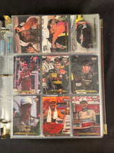 Assortment of Action Packed NASCAR Cards in Binder