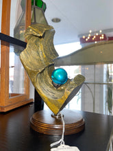 Hand Carved Soapstone Sculpture With Orb
