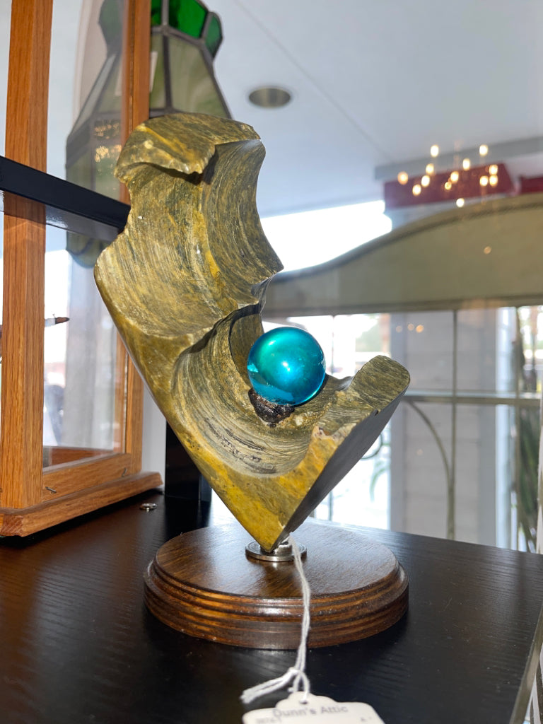 Hand Carved Soapstone Sculpture With Orb